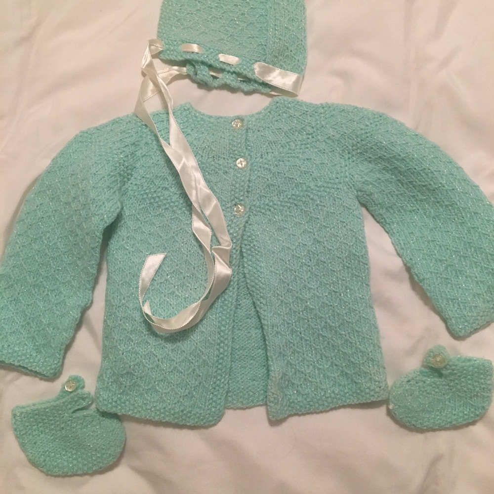 Infant beautiful sweater, hat and booties